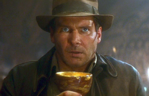 Harrison Ford as Indiana Jones in the Last Crusade holding the holy grail